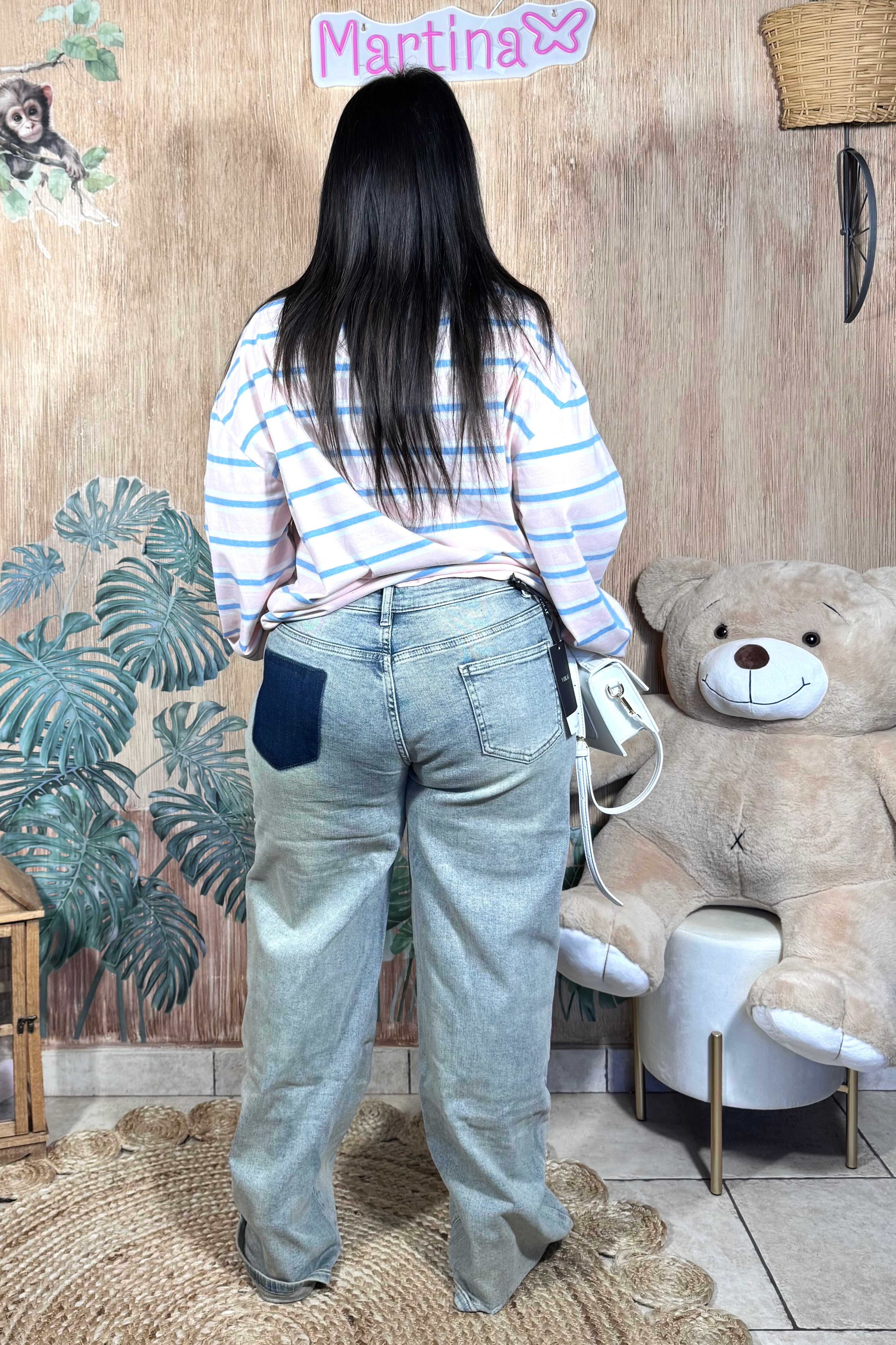 Jeans con chiusura laterale