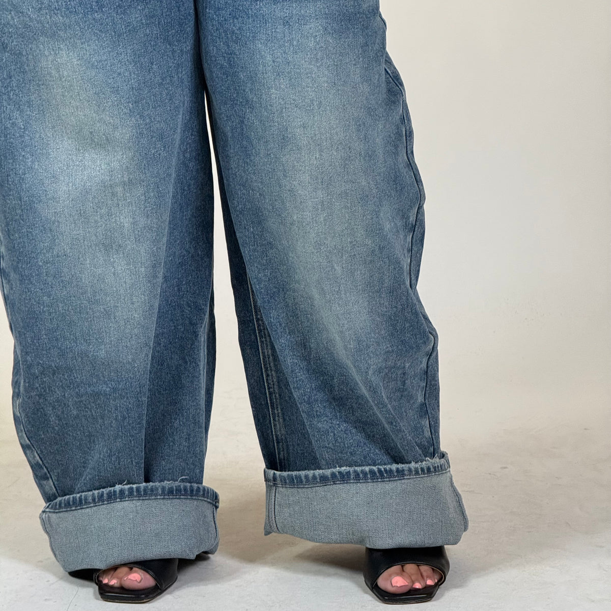 Jeans con inserto mimetico