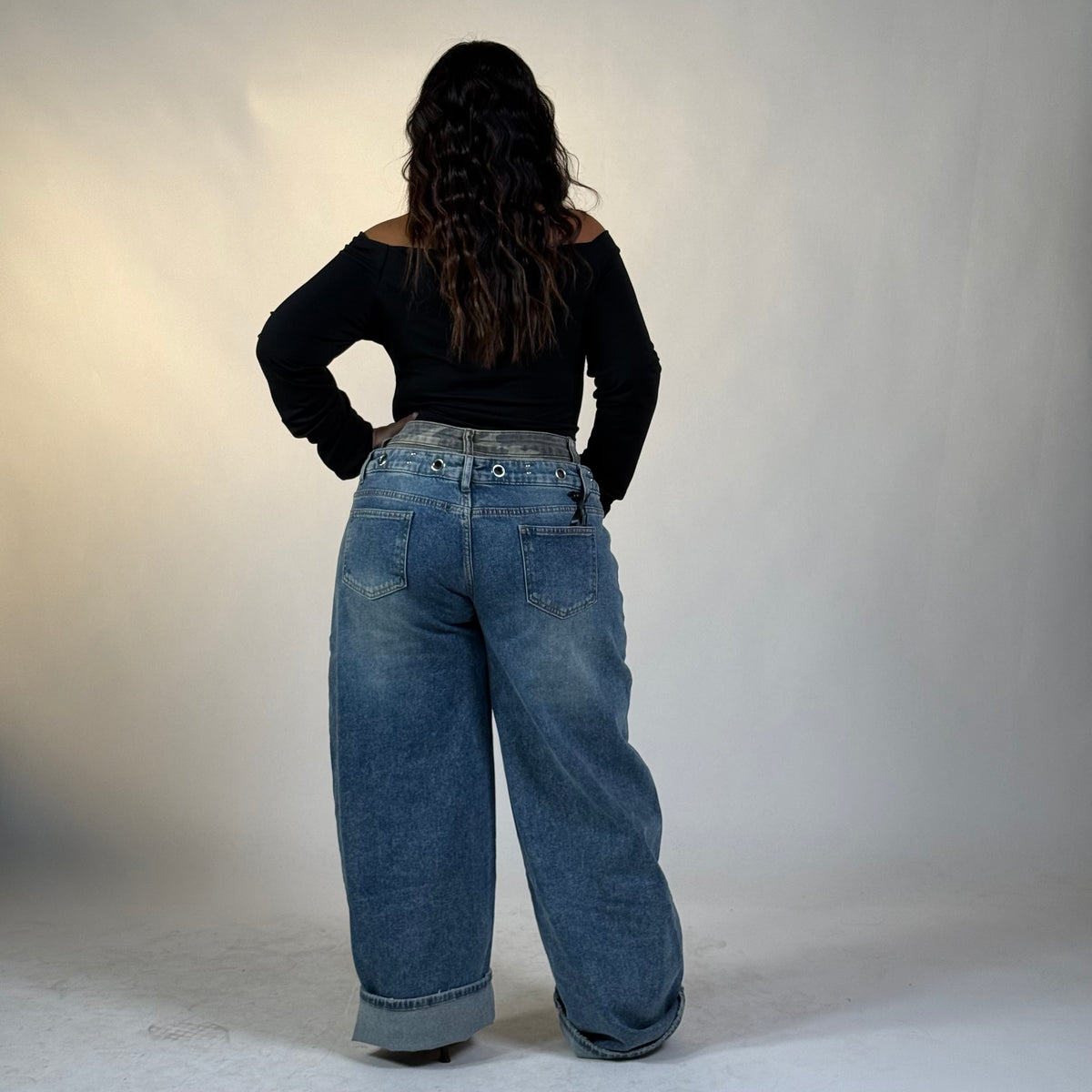 Jeans con inserto mimetico