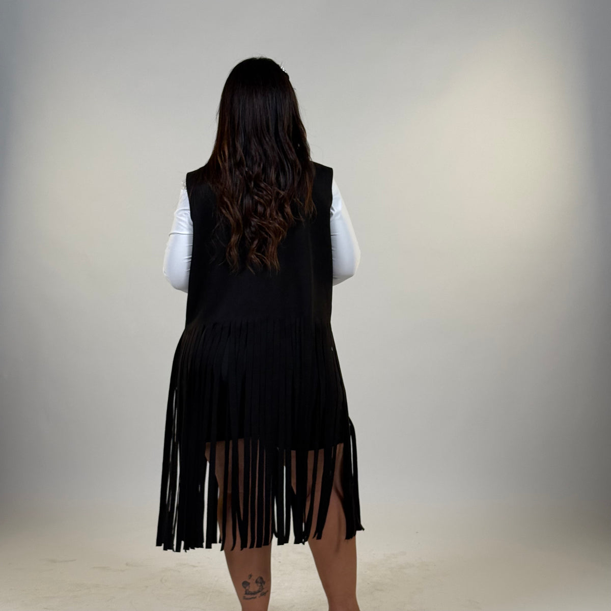 Gilet in renna con frange