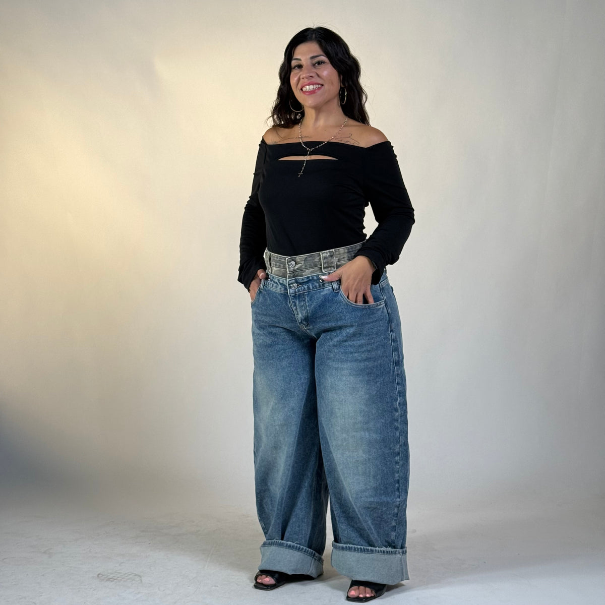Jeans con inserto mimetico