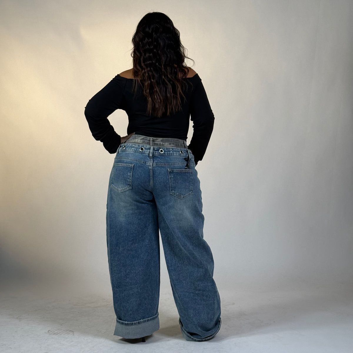 Jeans con inserto mimetico